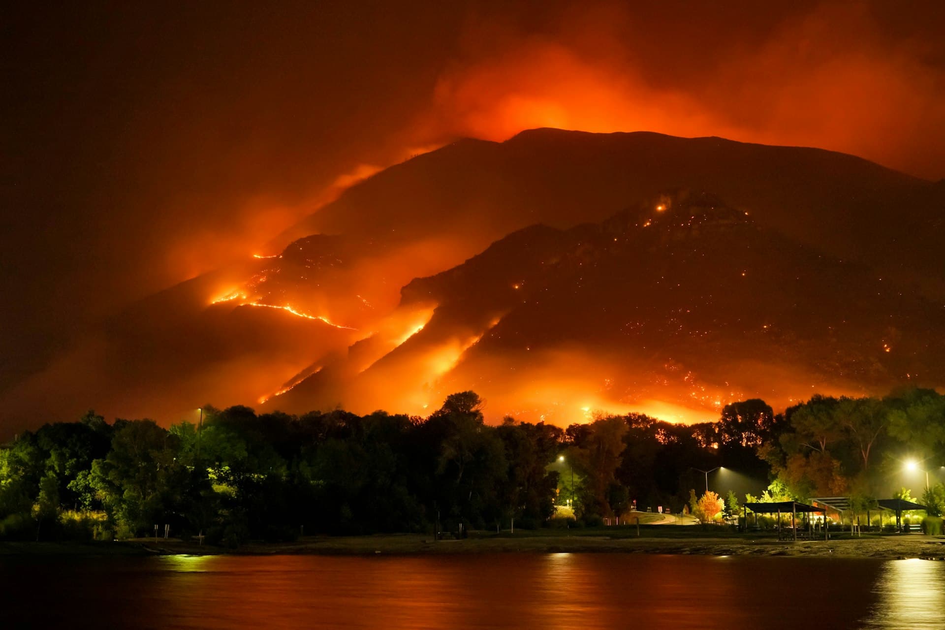 Wildfire burning in mountainous terrain