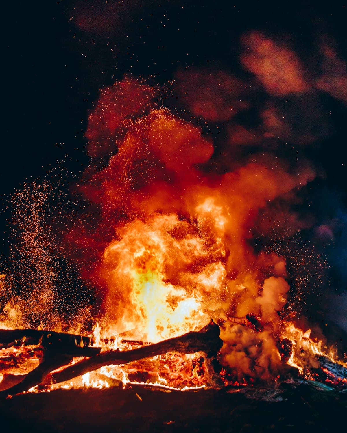 Wildland fire illuminating night sky during suppression operations